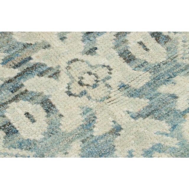 Hand-knotted in silk, this 2x2 classic square oriental rug from Rug & Kilim showcases a delicate geometric composition...