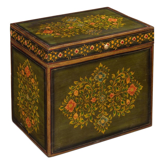 This exquisite wooden storage box from Rajasthan blends traditional artistry with authentic vintage character. Hand-...