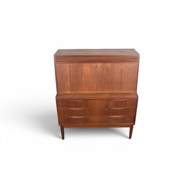 Origin: Denmark Designer: Erling Torvits Manufacturer: Klim Møbelfabrik Era: 1961 Materials: Teak Measurements: 41" wide x...