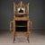 Found and originating in England, this bamboo framed cabinet dates from approximately 1890. The Aesthetic Movement era...