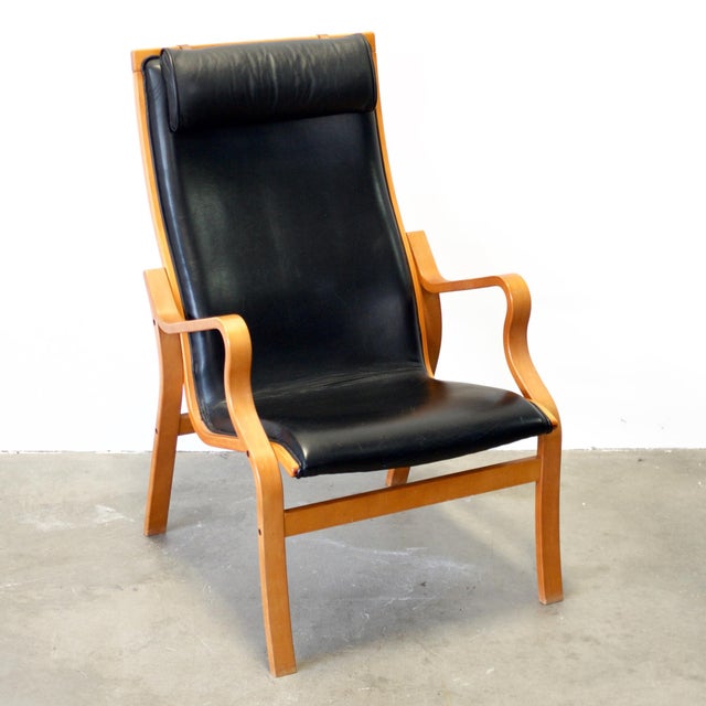 Dimensions: 24 3/4” L x 32” D x 40 1/2” H / Seat Height 16” Origin: Denmark Designer: Kurt Skovby Manufacturer: Kurt...