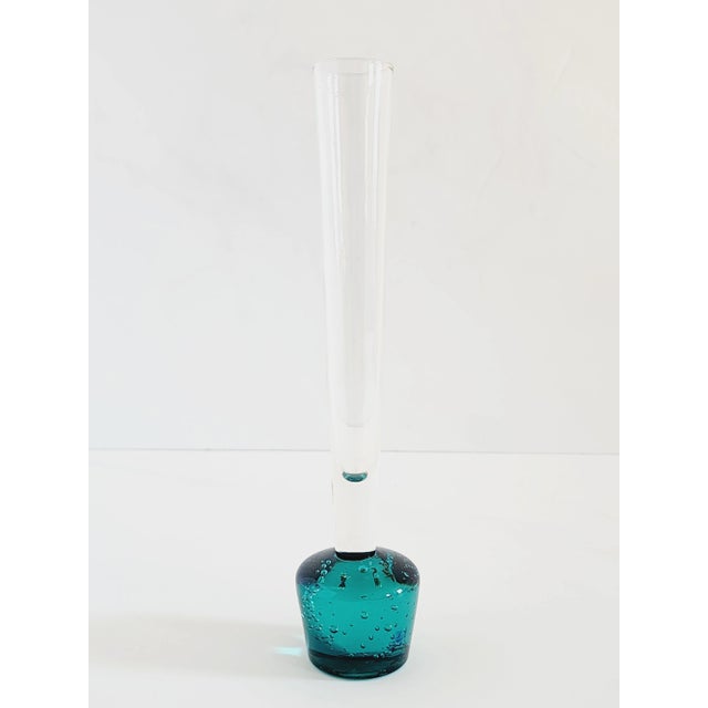 Unique Mid Century Modern teal blue barrel form base controlled bubbles bud vase designed by Per Lutken. A great piece to...