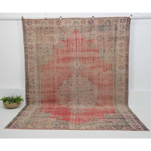Vintage Hand-Knotted area rug is a semi-antique vintage area rug. The '70s Eastern region of Anatolian's unique rug is...