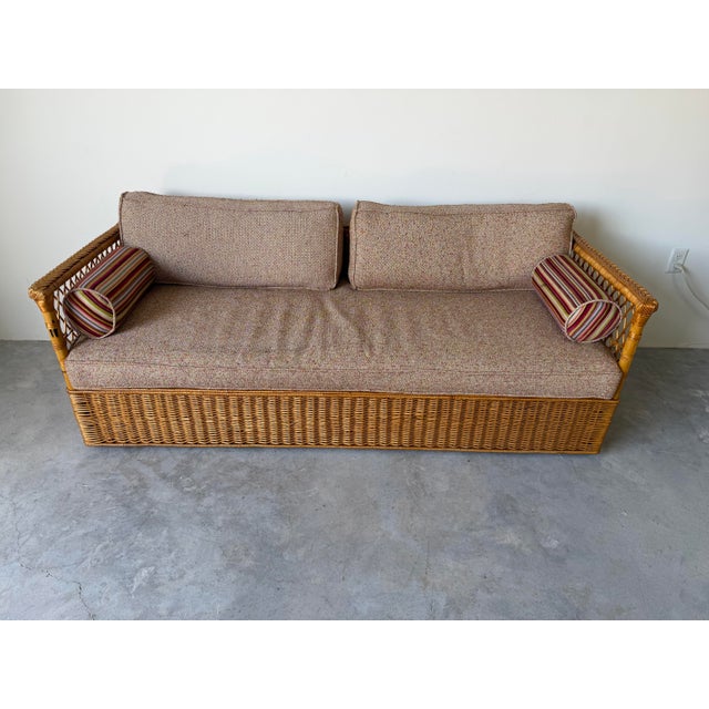 Beautiful vintage McGuire sofa crafted from high-quality rattan and wicker, showcasing the brand’s iconic coastal organic...