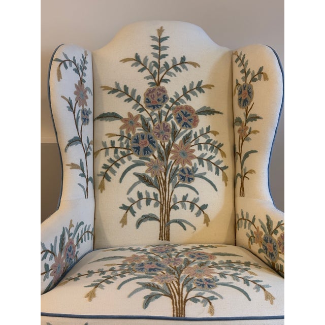Drexel 18th century style wingback chair Outside: plain blue venetian fabric Inside: custom made cream fabric with crewel...