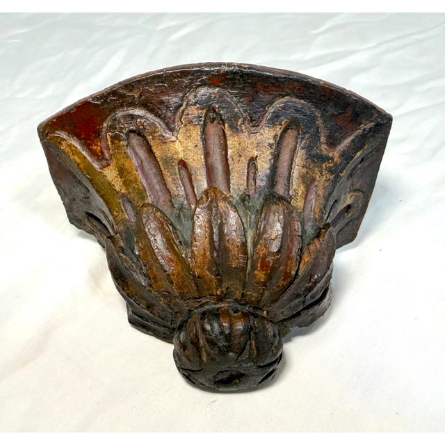 This antique 18th-century Baroque polychromed hand-carved wood wall shelf is a unique and elegant piece that adds a touch...