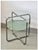 Enthusiasts of Thonet, Marcel Breuer or tubular furniture! Side table with double top and tubular frame The extra shelf in...
