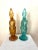 This pair of Bischoff glass decanters are adorable and rare! One is amber and the other aqua. They depict clown figures...
