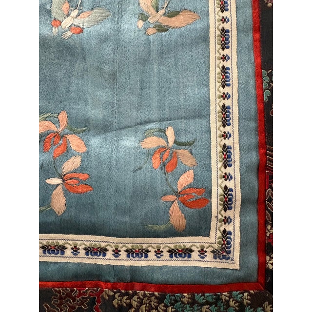 antique Chinese silk embroidered panel or textile art piece. It features delicate silk embroidery, commonly found in...