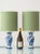 Pair of Royal Delft blue and white hand-painted table lamps, topped with custom made drum lampshades in a luminous light...