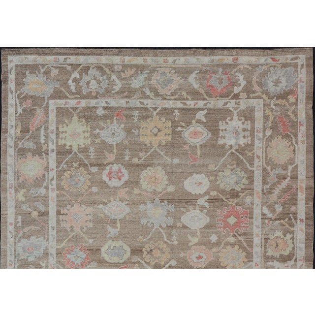 Turkish Oushak Rug With All-Over Floral Design on a Light Brown Field For Sale - Image 10 of 12