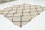 Elevate your living space with this sophisticated Modern Hand-Tufted Wool Rug, featuring a bold, oversized diamond trellis...