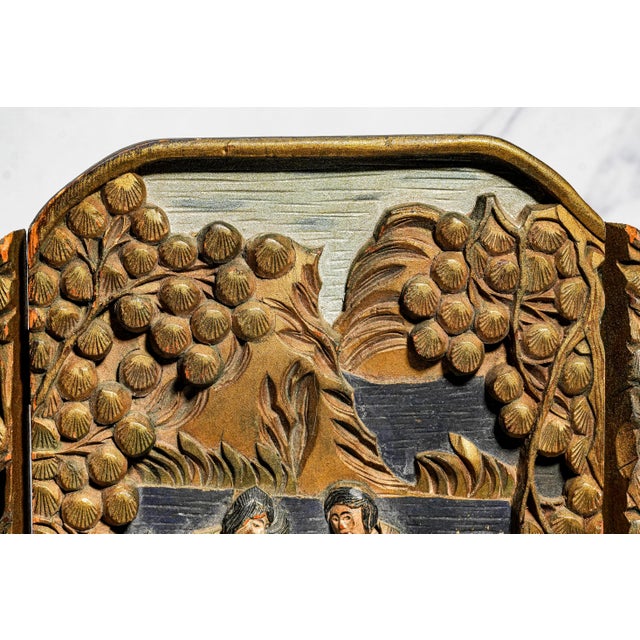 This charming vintage three-panel tabletop screen is a beautifully hand-carved and hand-painted example of East Asian...