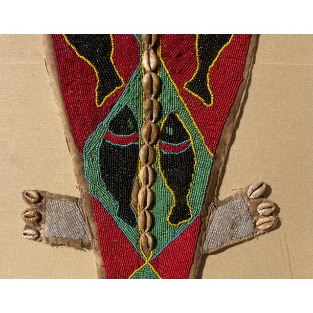 Hand made of local material, primitive beaded African Lizard panel, c. 1920's. Beautifully mounted and framed.