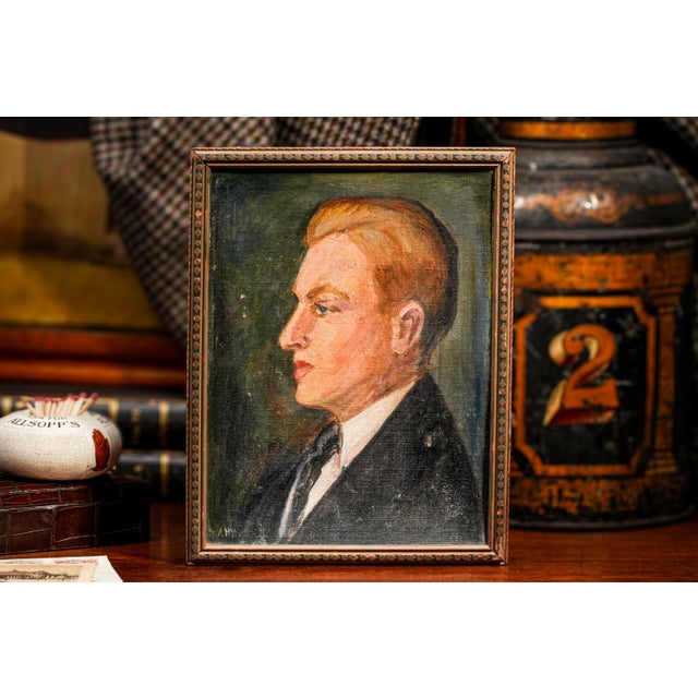 This captivating Art Deco era portrait presents a young man in formal attire, radiating an aura of elegance and mystery....