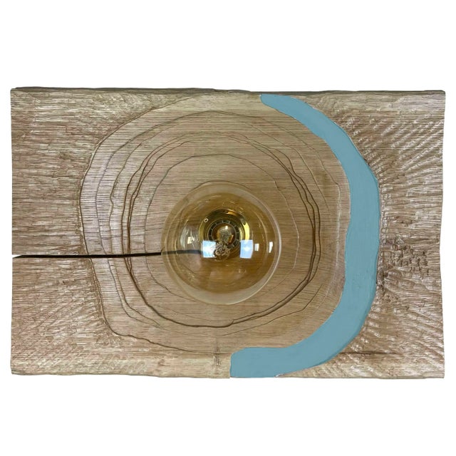 "Trottola Azzurra" Lamp by Pietro Meccani, 1996. Beautiful wall lamp in carved oak with blue painted parts. The woodwork...