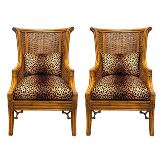 Pair of Double-Caned Rattan Wing Chairs With Leopard Upholstery For Sale