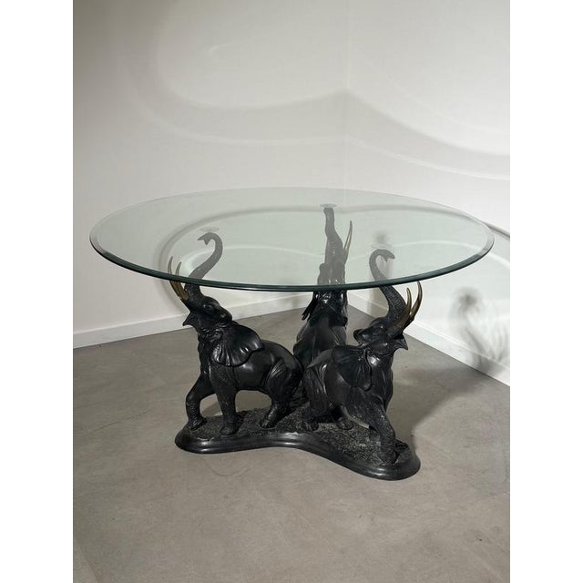 Bring bold vintage luxury into your interior with this extraordinary elephant trio coffee table featuring a sculptural...