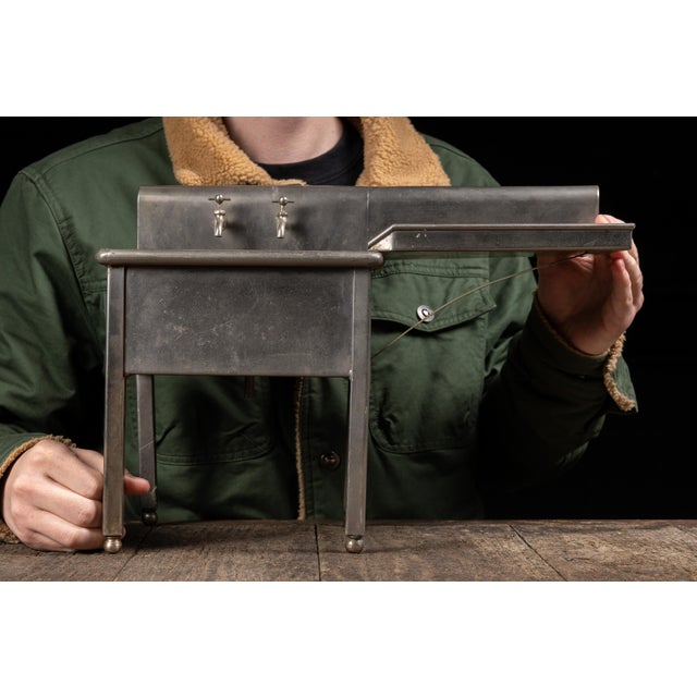 Vintage unbranded salesman sample stainless steel sink.