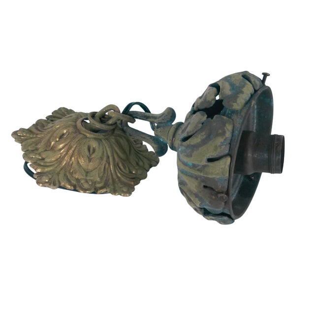 This metal cast ceiling-mount pendant assembly was produced by the renowned Loevsky & Loevsky White Metal Casting Company...
