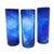 A trio of deep cobalt vessels—hand-blown, bold, and beautifully imperfect. Each carries with it the hush of molten memory,...
