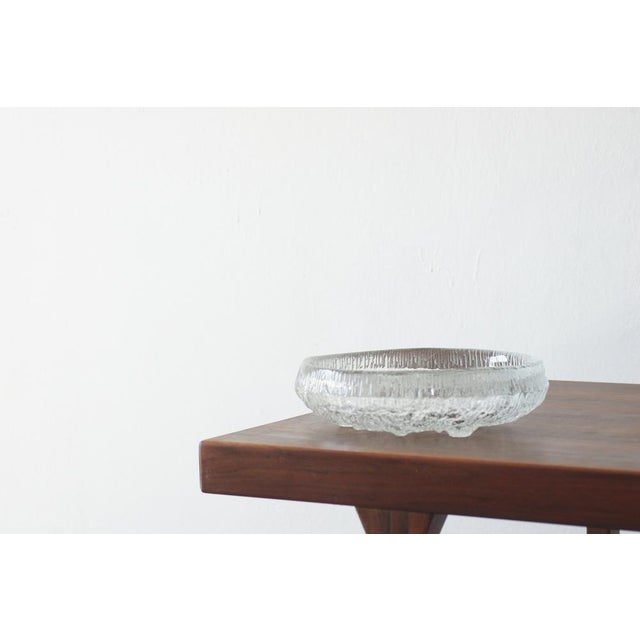 The Lunar Bowl, designed by Tapio Wirkkala for Finnish brand Iittala, is one of the most distinctive examples of mid-20th...