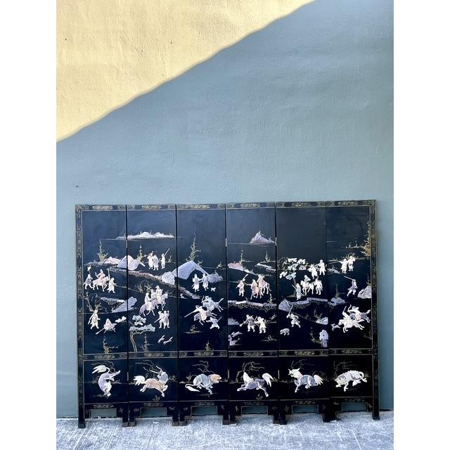 This monumental six-panel room divider is a breathtaking example of Mid-Century Chinoiserie artistry, offering both...