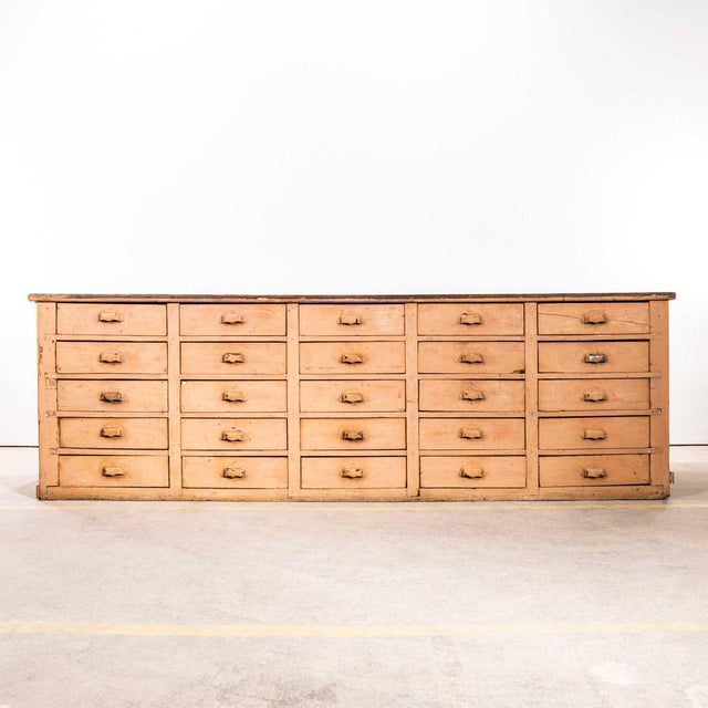 1930’s exceptional very large french 2.5 metre bank of drawers. Massive bank of drawers sourced in france. The cabinet is...