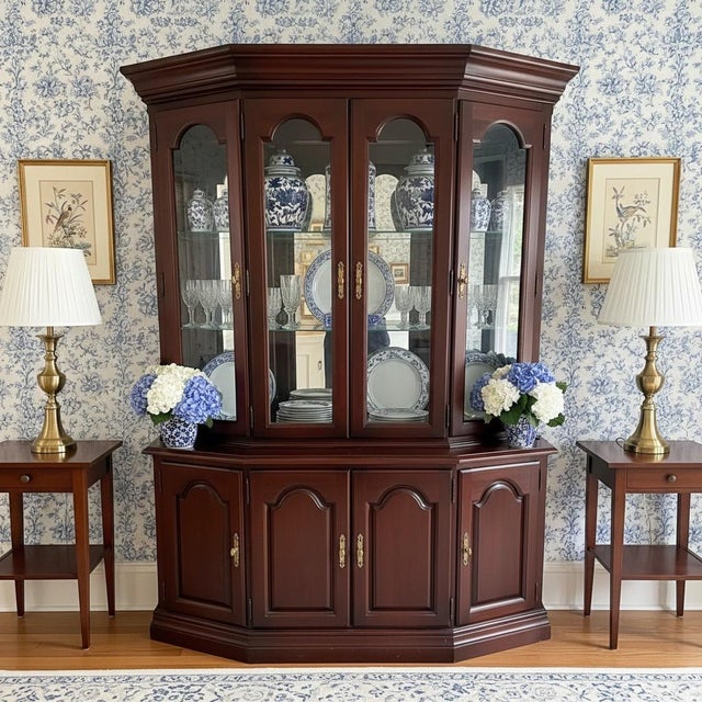 Bring timeless American craftsmanship into your home with this Broyhill two-piece cherry china cabinet, made in the USA....