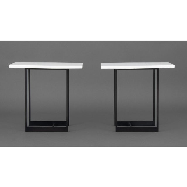 Pair of Contemporary White Marble Top Side Tables, mounted on patinated black metal bases. 19" H x 20" W x 13" D....