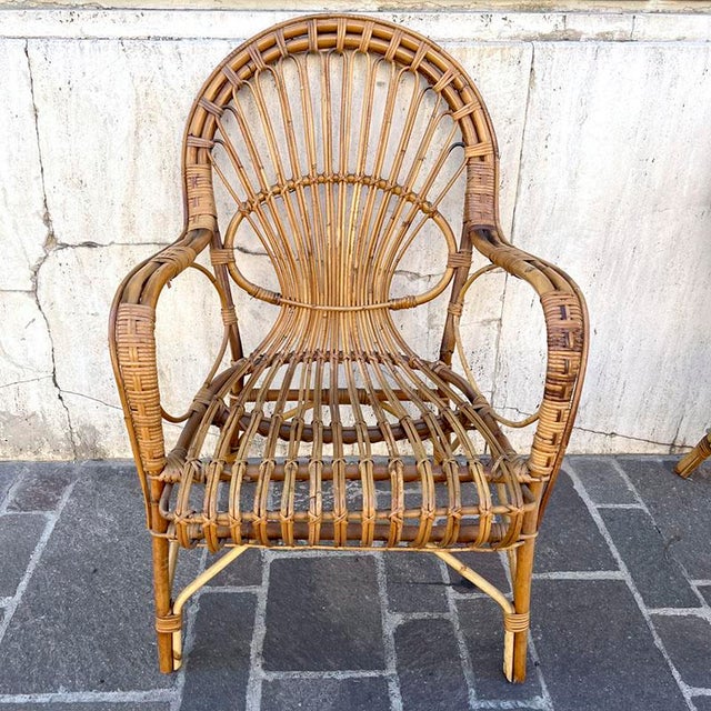 Vintage 1960s italian bamboo living room set, in excellent condition. It consists of two comfortable armchairs with...