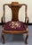 Gorgeous late 19th century carved mahogany Georgian arm chair. Graceful curved arms with subtle cabriolet legs and carved...