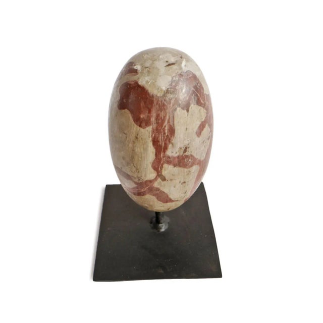 Natural oblong quartz Shiva Lingam stones from the Narmada River in Rajasthan, North India. These special natural formed...