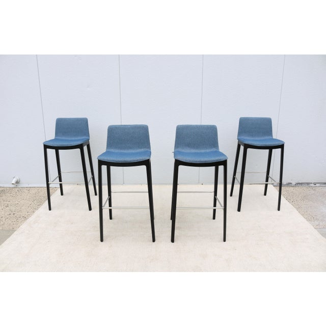 Fabulous set of four Flex bar stools, an award-winning barstool designed by the renowned designer Piergiorgio Cazzaniga...