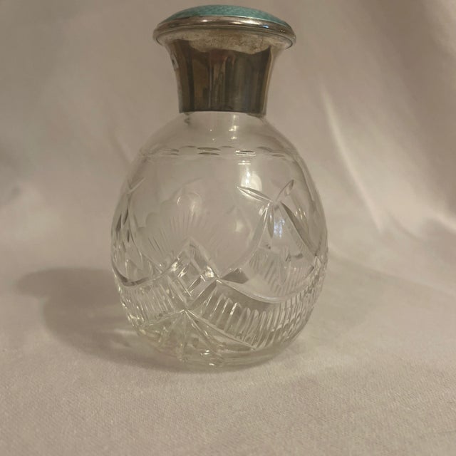 Beautiful 1920s cut crystal bud vase with a sterling silver collar and blue guilloche enamel.