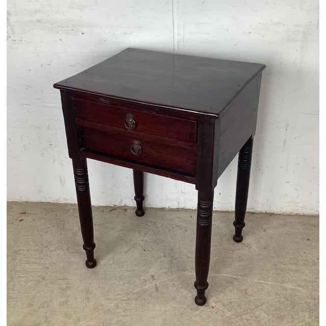 A beautifully preserved antique American stand from the Federal period — the kind of piece that carries genuine history in...