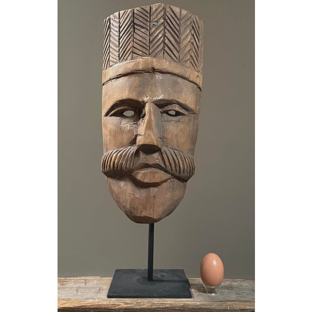 Vintage Hand Carved Mexican Folk Art Mask of a Man with Mustache Dimensions: 14.25” H × 7” W × 3.75” D A carved wooden...