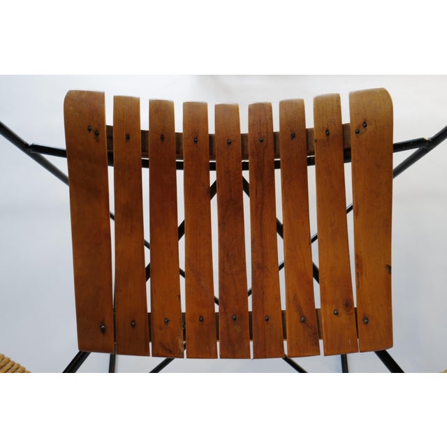 The Arthur Umanoff rocking chair is a timeless piece of furniture that combines elegant design with exceptional comfort....