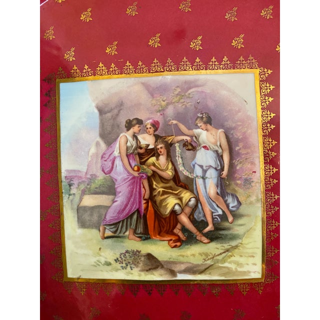 This is a dazzling red and golden portrait platter with handles from the 1890s in excellent condition. There is a signed...