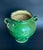 Antique terracotta jar from South-West France, dating to the 19th century. Featuring a rich green glaze with natural...