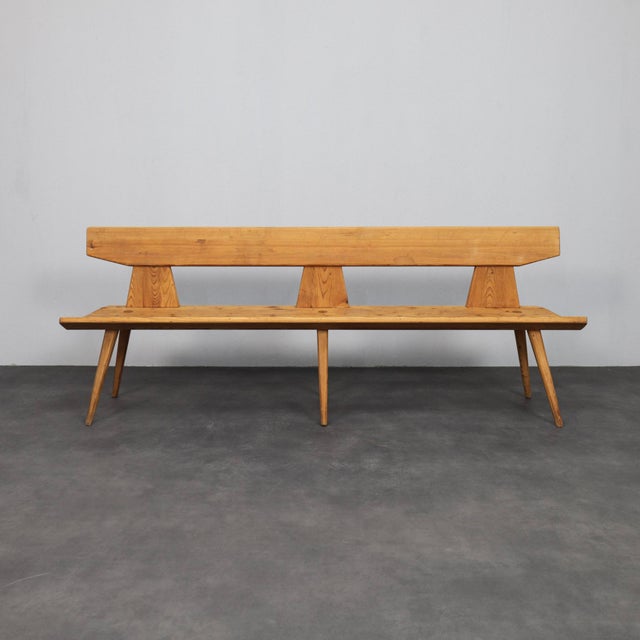 This pine bench by jacob kielland brandt reflects the clarity and structural honesty of mid-century danish design. Created...