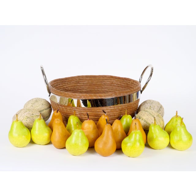 A striking late 20th-century decorative table centerpiece in a Mid-Century Modern style, featuring a large round basket...