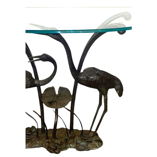 A sculptural vintage console table by the renowned American furnishings company LaBarge, dating to circa 1980's. The table...