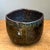 Celebrating the beauty of handcrafted studio ceramics, this vintage abstract stoneware bowl is a striking example of mid-...