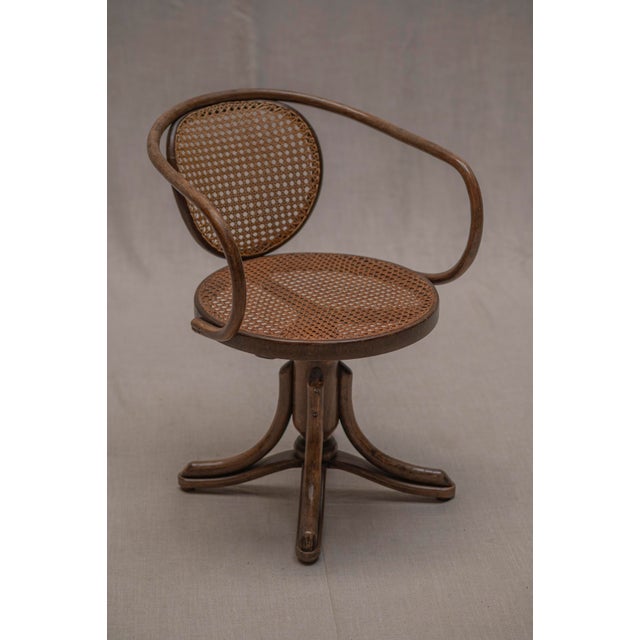 An elegant and characterful bentwood desk chair attributed to thonet, dating from the early 20th century. A particularly...