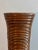 Beautiful large vase constructed completely from spiraled rattan vine. Expertly hand crafted and held together with tiny...