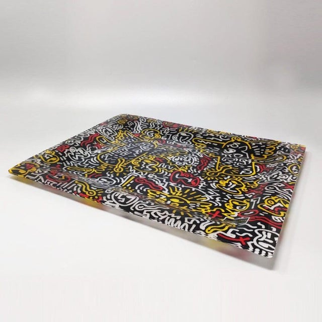 1990s rectangular serving tray seamlessly bridges the worlds of functional design and contemporary street art. Produced in...