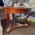 Neoclassical Giltwood and Doré Bronze-Mounted Mahogany Center Table, circa 1850. The circular figured-mahogany top above a...