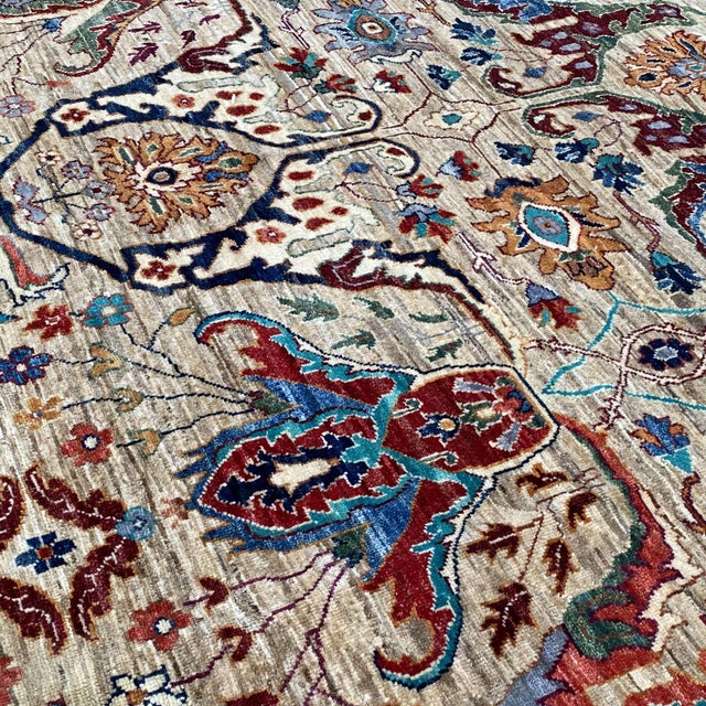Persian Khorassan design hand-knotted rug featuring a bold all-over arabesque composition of large-scale palmettes,...