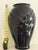 This lovely vintage black glass vase feature a geometric relief with a modern glossy black finish. It would be a bold plan...